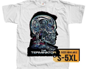 May include: White t-shirt with a graphic of a robot head with a human face. The robot head is made up of gears and wires. The text "The Terminator" is printed below the graphic. The text "Sizes Available S-5XL" is printed on a yellow tag.