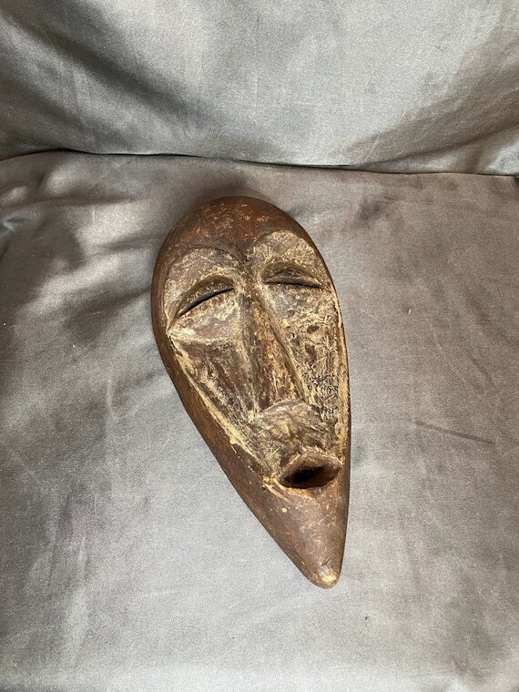 African Carved Wood Mask Art - image 1