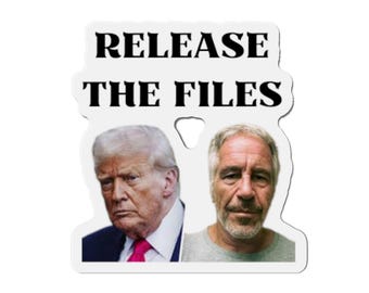 May include: A white sticker with the text "RELEASE THE FILES" in black, above images of two men. One man is wearing a suit and tie, the other a gray t-shirt. The sticker has a unique shape.