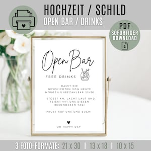 Peut inclure: Un panneau encadré avec les mots "Open Bar" en écriture élégante, avec "Free Drinks" en dessous. Le panneau comprend une illustration de cocktail et du texte en allemand. Le cadre est doré, pour les mariages ou événements.