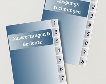 May include: Two blue binders with white text and numbered tabs. The binder on the left says "Auswertungen & Berichte" and the binder on the right says "Ausgangs-rechnungen".