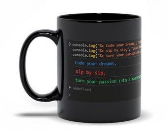 May include: Black coffee mug with a white design featuring code that reads "Code your dreams, sip by sip, turn your passion into a masterpiece".