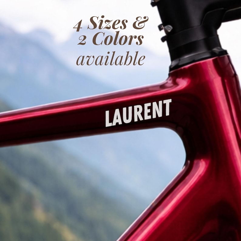 Premium custom bike name sticker designed for cyclists who want a clean, high-end look on their bicycle frame. This personalized vinyl decal is perfect for road bike branding, gravel riding setups, or MTB customization. Ideal as a cycling gift, bike accessory, or unique rider label. Easy to apply, weatherproof, and long-lasting, it enhances your bike with a professional finish while making your cycling gear stand out on every ride.