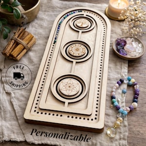 May include: A set of three ceramic mugs with a speckled, matte finish. The mugs are in shades of cream, light gray, and dark gray. Each mug has a simple, minimalist design, perfect for coffee or tea.