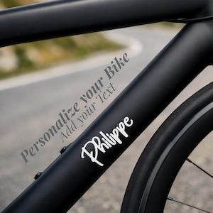 Custom bike frame sticker with personal name, perfect road bike decal for cyclists who want a unique look. This personalized bicycle vinyl is ideal for bike customization, cycling gifts for men or women, and road cycling enthusiasts. Durable waterproof adhesive made for outdoor use, great for top tube decals or gravel bike stickers. A thoughtful cyclist gift idea for birthdays, holidays, or cycling team members who love clean and minimal bike accessories.