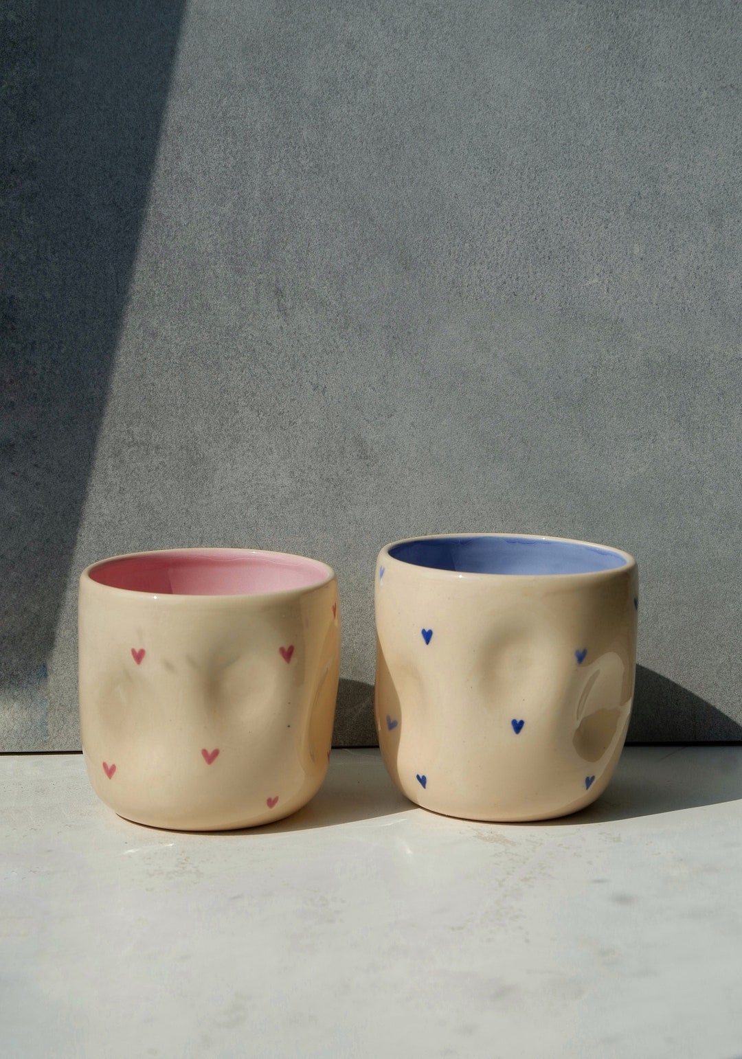 Set of two ceramic tumblers with blue and pink hearts, Two cute beige cups with blue and pink hearts, Ceramic coffee cups Mother’s Day gift