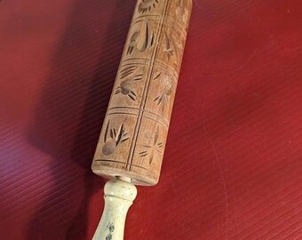 Vintage reverse embossed/carved wooden rolling pin