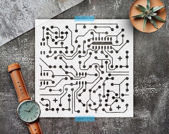 May include: A square white stencil featuring a black printed circuit board pattern with intricate lines, circular nodes, and a central rectangular integrated circuit component. The design includes several small plus signs scattered throughout the layout.