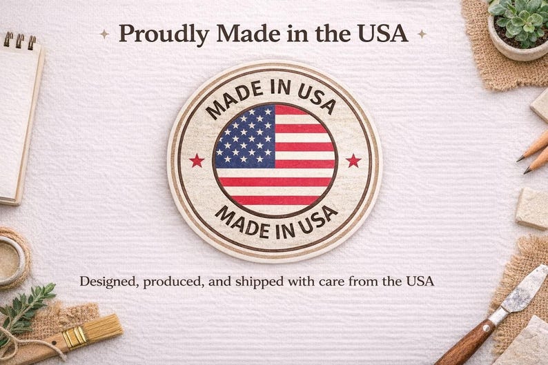 a circular "Made in USA" stamp with an American flag design, surrounded by various craft supplies and a notebook, along with the text "Proudly Made in the USA" and "Designed, produced, and shipped with care from the USA".