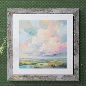 Peut inclure: Une peinture encadrée d'un paysage coloré avec un grand nuage moelleux dans le ciel. La peinture est dans un cadre en bois rustique.