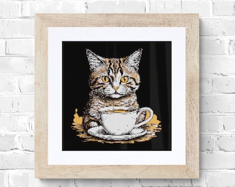 May include: A brown tabby cat with yellow eyes sits on a black background, holding a white coffee cup with a brown liquid inside. The cat is looking directly at the viewer.