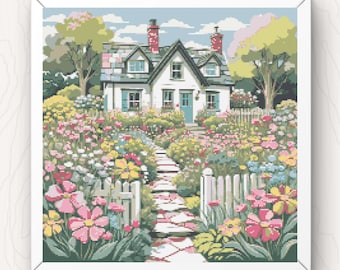 Puede incluir: Una casa blanca con techo verde y un jardín de flores en frente. El jardín tiene un camino que lleva a la puerta principal de la casa. Las flores son de color rosa, amarillo y azul.