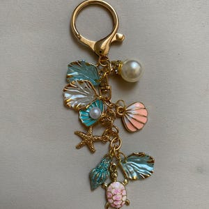 Perle und Muschel Schlüsselanhänger, Schlüsselanhänger Strand Thema, Handgemachter Strand Schlüsselanhänger Charm, Geldbörse Charm Ocean, Seashell Geldbörse Charms, Mermaidcore Tasche