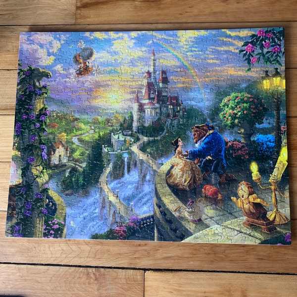 Completed 500 piece Beauty And The Beast Puzzle