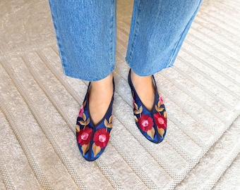 ample project . floral embroidery theater flats in rich blue . purely handmade