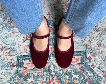 ample project . burgundy velvet mary janes . purely handmade