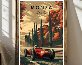 May include: A framed vintage-style poster featuring a red race car speeding down a track in Monza, Italy. The poster has a brown wooden frame and the text "MONZA Italy" at the top. The background shows tall trees and an orange and tan sky.