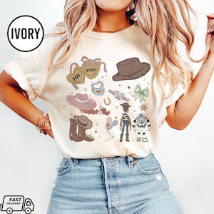 Retro Toy Story Comfort Color Shirt, Woody Buzz Jessie Tee, Pixar Character Badge Tee, Cute Disney Toy Shirt, Disney Family Trip 2026 Shirts