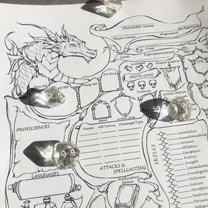 May include: A black and white character sheet for a tabletop role-playing game. The sheet includes sections for character name, player name, class, background, alignment, race, level, experience points, successes, death saves, failures, passive wisdom, saving throws, speed, armor class, name, attack bonus, damage type, attacks and spellcasting, proficiency bonus, and skills. The sheet also includes a dragon illustration and several dice.