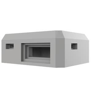 May include: A gray concrete bunker with two small windows and a large opening in the front.