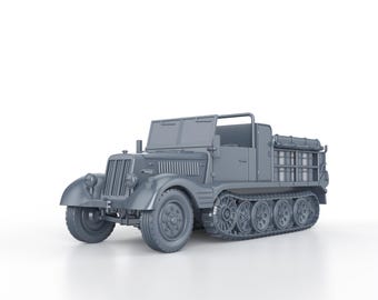 May include: A gray model of a military tracked vehicle with a canvas top and a cargo bed with metal containers. The vehicle has a large front grill and a driver's cab with a windshield.