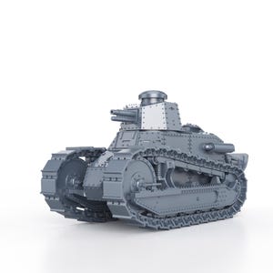 Könnte beinhalten: Ein graues Metallmodell eines französischen Panzers mit Ketten und einem Turm. Der Panzer hat ein weißes rechteckiges Panel auf dem Turm.