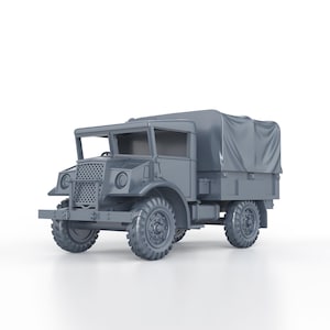 Puede incluir: Modelo gris de un camión militar vintage con una cubierta de lona sobre la zona de carga. El camión tiene neumáticos grandes y con tacos y una parrilla delantera detallada. Es un modelo a escala, probablemente para coleccionistas.