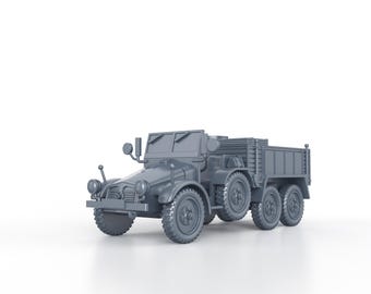 May include: A gray model of a military truck with a flatbed cargo bed. The truck has a canvas top and a spare tire mounted on the back.