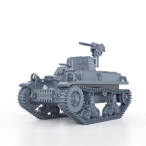 May include: A gray plastic model of a Japanese Type 94 tankette, a small armored fighting vehicle used by the Imperial Japanese Army during World War II. The model features detailed tracks, a machine gun, and a small turret.