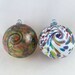 Blown Glass Christmas Balls (pair of two)– 2.75" Transparent Mix & Transparent Mix on White