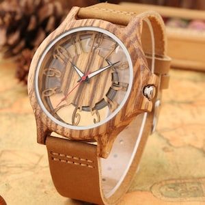 Hombres Mujeres baratos relojes Casual de oro transparente reloj