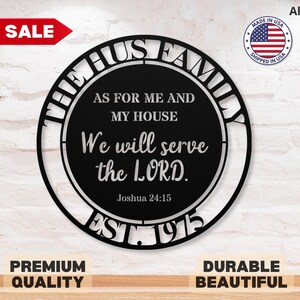 May include: Black metal wall art with the text "THE [family name] FAMILY" and the quote "As for me and my house, we will serve the LORD." with "Joshua 24:15" and "EST. 1975". Includes a red "SALE" banner.