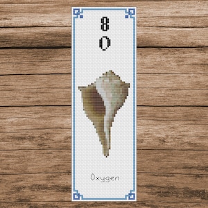 May include: A white bookmark with a blue border and a seashell illustration. The bookmark has the number 80 and the word "Oxygen" printed on it.