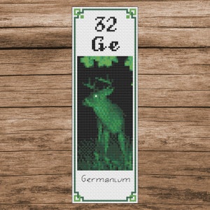 May include: A green bookmark featuring a deer silhouette and the text "32 Ge Germanium".