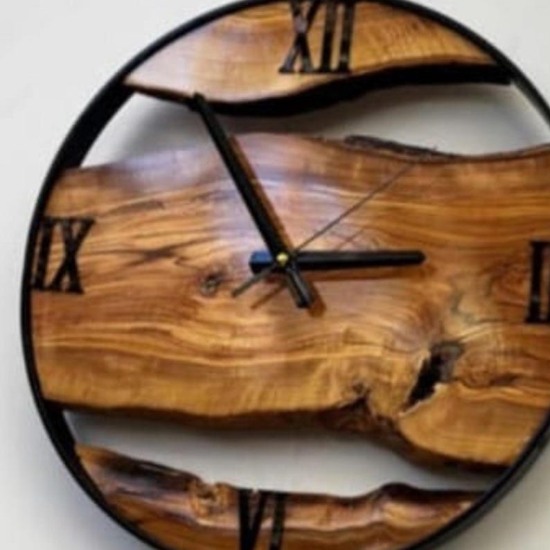 Minimalist rustic wall clock crafted from solid olive wood slabs.