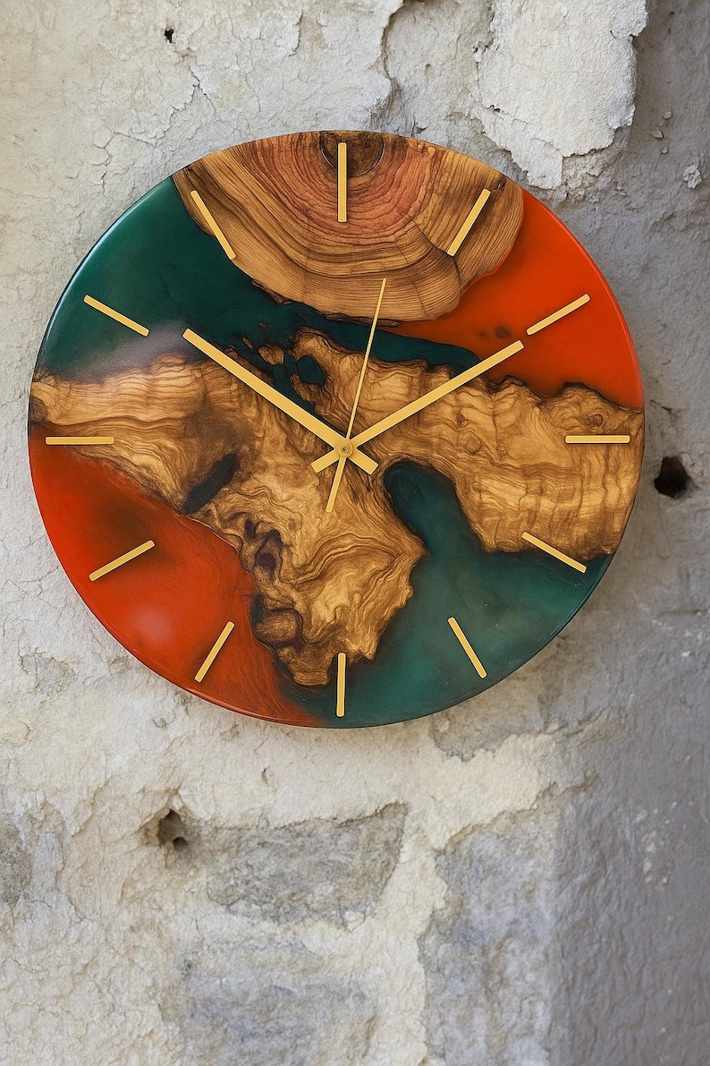 Artistic olive wood clock featuring live edge details and vibrant resin colors.