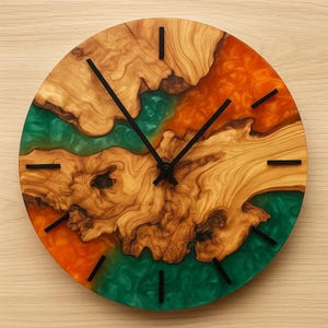 Handmade olive wood and colorful epoxy resin wall clock.