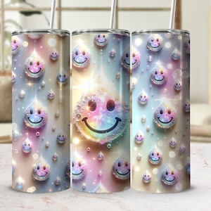 May include: Three stainless steel tumblers with a rainbow background and a pattern of smiling faces in raindrops.