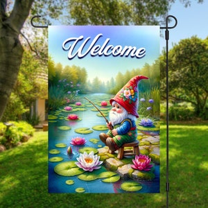 May include: A garden flag with a whimsical illustration of a gnome fishing in a pond with lily pads and the word "Welcome" in a decorative font.