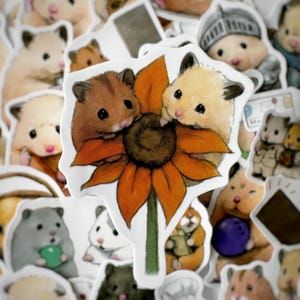 May include: Two cartoon hamsters are nestled in a large orange flower with a brown center. The hamsters are white and brown with pink noses and black eyes. The flower has a green stem.