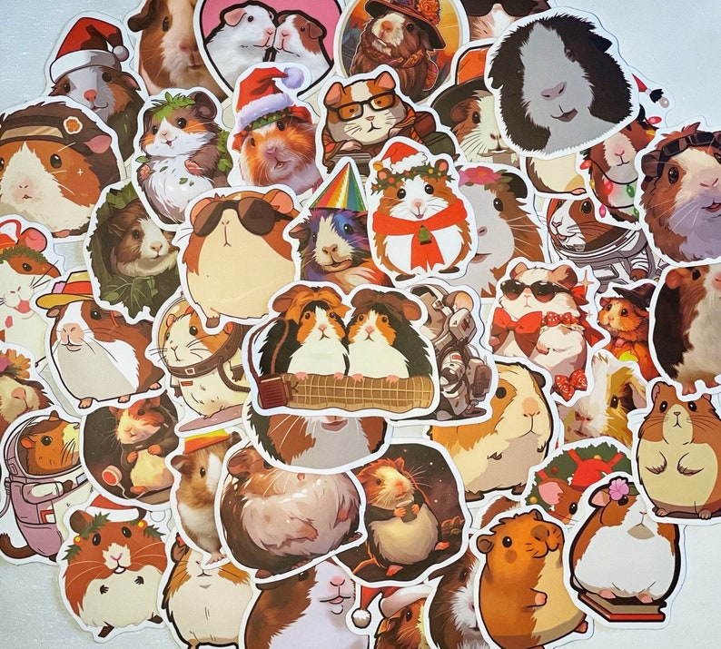 May include: A collection of colorful stickers featuring cartoon guinea pigs in various poses and wearing different hats and accessories. The stickers are perfect for adding a touch of whimsy to laptops, water bottles, journals, and other surfaces.