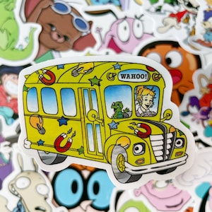 May include: A yellow school bus sticker with a cartoon driver, stars, light bulbs, and magnets. The bus has the word "WAHOO!" on the side.