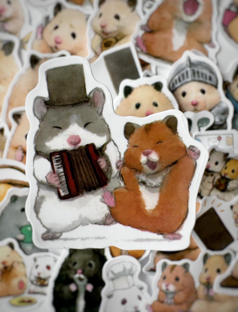 May include: Two cartoon hamsters, one wearing a top hat and playing an accordion, the other with its mouth open, are depicted on a white sticker. The sticker is surrounded by other stickers featuring various cartoon hamsters.