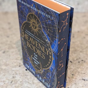 UK Heavenly Bodies by Imani Erriu with custom sprayed constellation star edges, stenciled edges, Special Edition Books