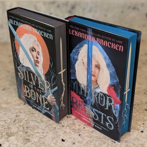 SIGNED Silver in the Bone and Mirror of Beasts with custom sprayed sword edges | Special Edition Books | Booktok | Fantasy Books