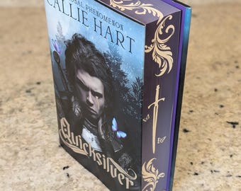 Tapa dura Quicksilver UK: Bordes degradados morados personalizados, cubierta con lámina oculta estampada con espadas