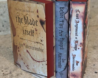 The First Law Trilogy by Joe Abercrombie, UK hardbacks, custom sprayed edges, special edition books, book lover gifts, Blade Itself, fantasy