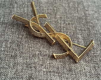 VTG YSL Yves Saint Laurent Vintage gouden broche 7 cm metalen stalen logo monogram