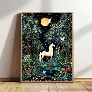 May include: A framed wall art print featuring a white unicorn standing in a dark forest at night. A large yellow moon hangs in the sky above, surrounded by stars. White birds fly through the trees, and a small pond with water lilies sits below.