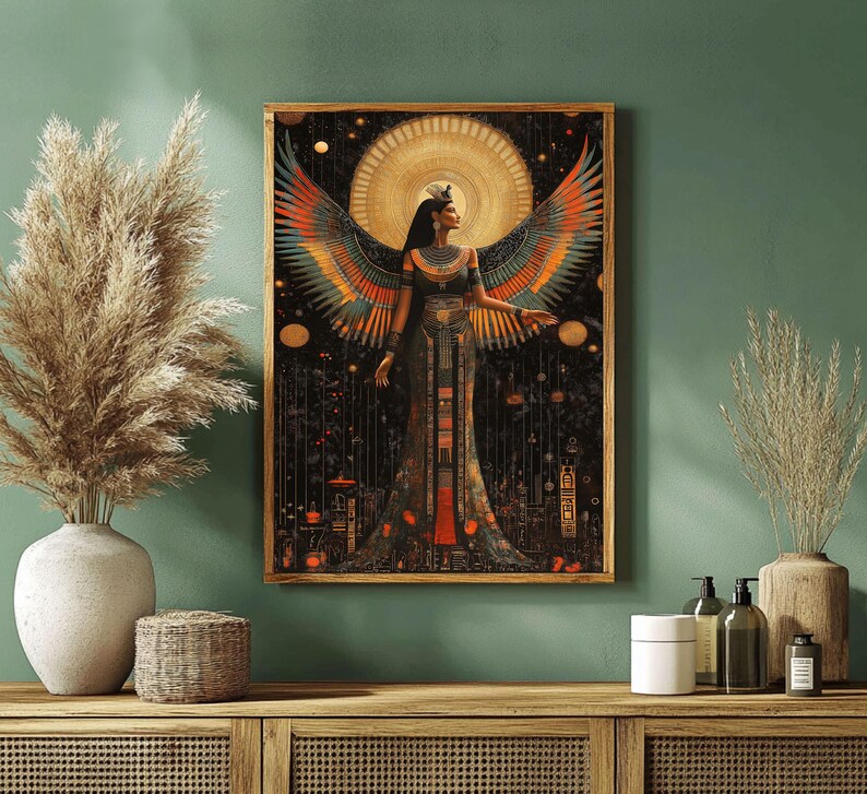 May include: A framed art print depicting a woman with large, colourful wings. The artwork has a dark background with gold and orange accents, and the woman is wearing a detailed, ornate dress. The print is displayed on a green wall.